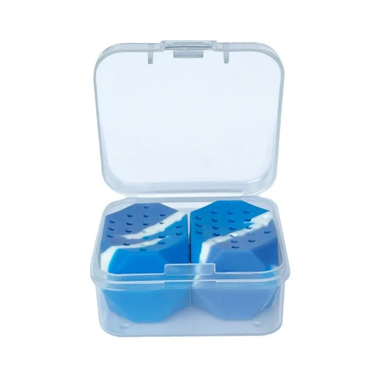 Two camouflage silicone facial muscle fitness balls for jaw training.