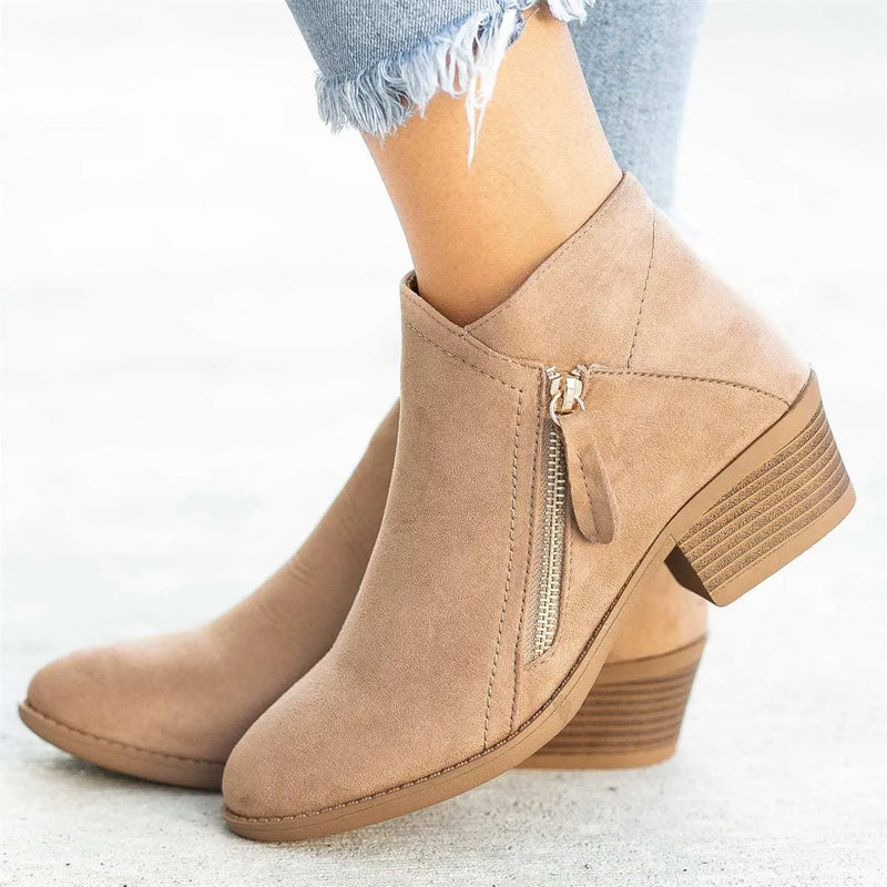 Women's Dr Martens boots with side zipper and chunky heel in suede leather, lightweight wear-resistant design available in beige, black, blue, and orange colours in sizes 35-43.