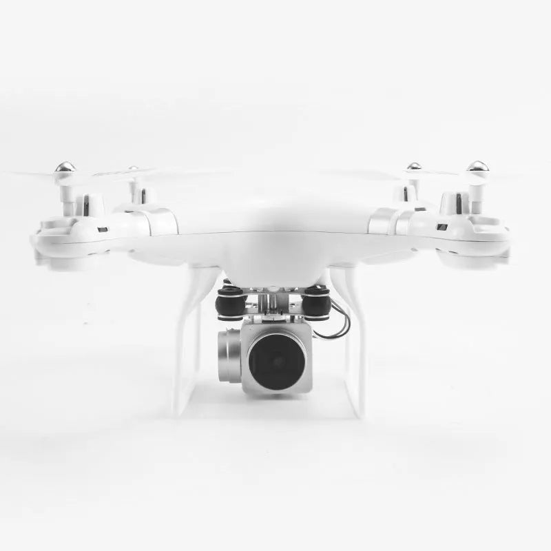 Alloy-built black HD aerial photography drone with remote control handle on grass