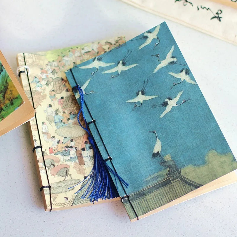 A5 antique wire-bound notebook with classical artwork cover, black oil wax rope binding, and decorative tassels