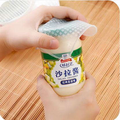 Food grade silicone stretch cling film covering bowl showing stretch capability and seal