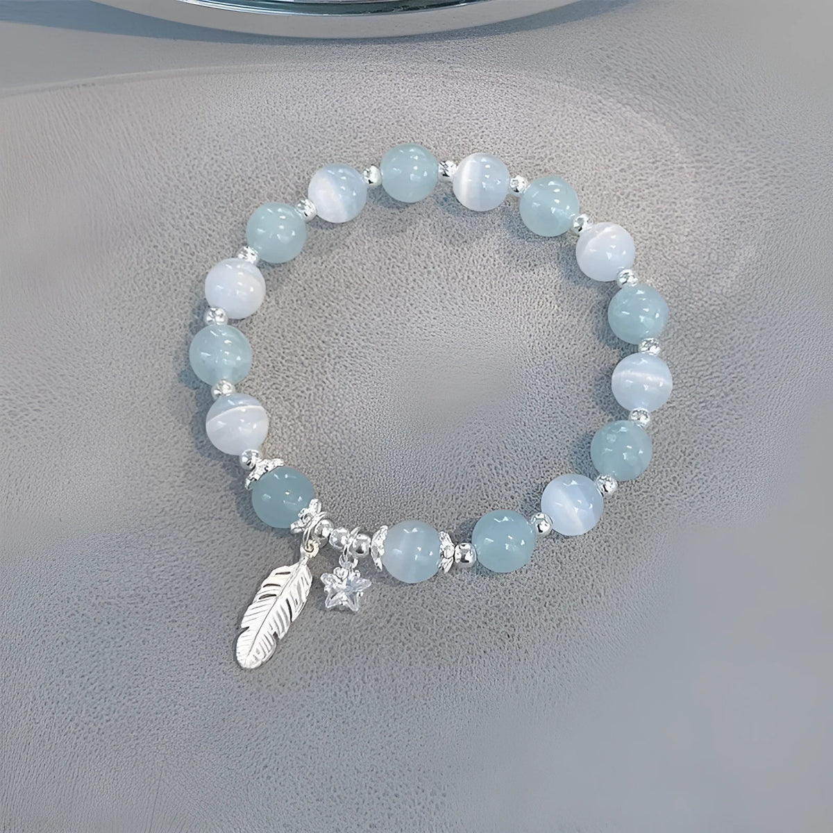 Small white girl crystal bracelet with blue moonlight feather charm and Korean style design