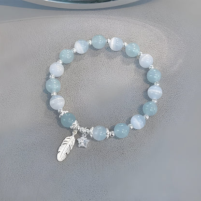 Small white girl crystal bracelet with blue moonlight feather charm and Korean style design