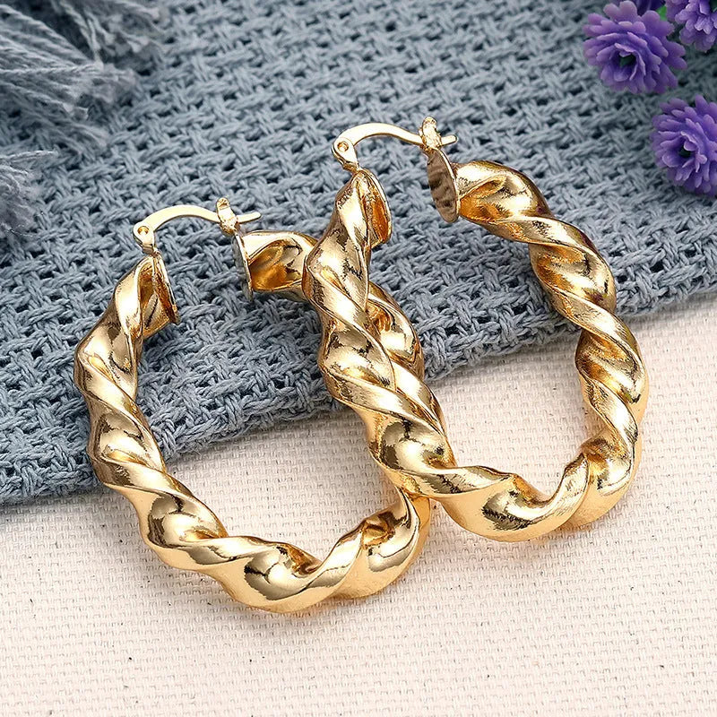 Geometric ring design ear clips for women with drop-shaped copper construction and electroplated finish