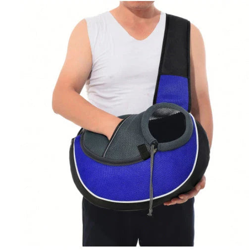 A stylish and secure crossbody carrier bag designed for transporting pets comfortably and safely