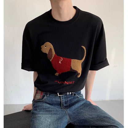 Men's black cotton T-shirt with embroidered sausage dog wrapped in a towel design