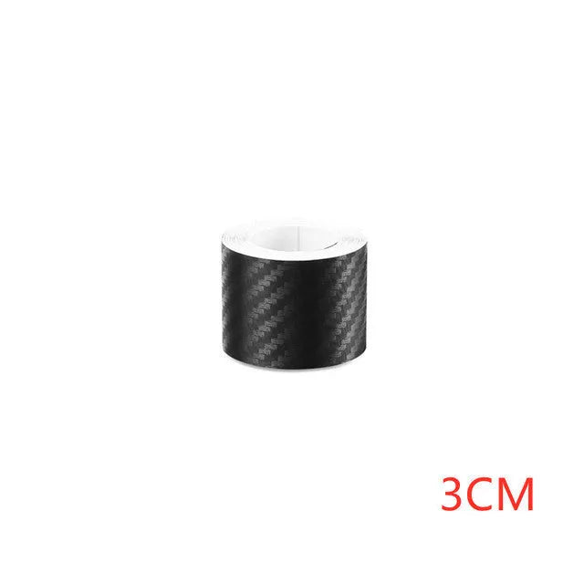 Carbon fibre roll bumper sticker for car doors and sills in matte black finish, available in 3cm, 5cm, 7cm and 10cm widths with lengths from 1 metre to 5 metres for waterproof anti-scratch protection.