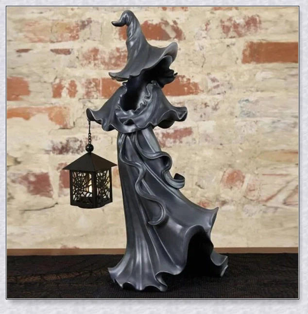 Witch With Lantern Decoration - A premium resin figurine that casts a mesmerising glow, adding enchantment to any space.