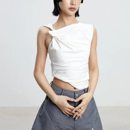 Elegant asymmetric tank top with unique folds, sleeveless high street fashion for the modern British woman