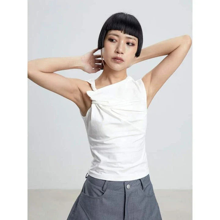 Elegant asymmetric tank top with unique folds, sleeveless high street fashion for the modern British woman