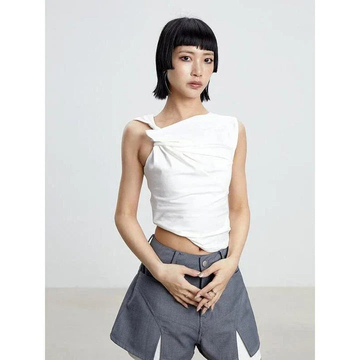 Elegant asymmetric tank top with unique folds, sleeveless high street fashion for the modern British woman
