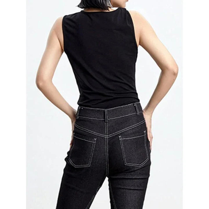Elegant asymmetric tank top with unique folds, sleeveless high street fashion for the modern British woman