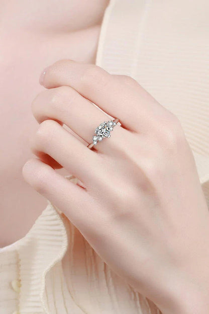 Elegant 1 carat moissanite heart-shaped ring with sterling silver setting and zircon accents