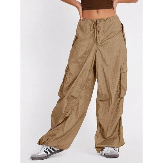 High-waist safari-style cargo trousers in black, featuring a comfortable, relaxed fit and unique design elements