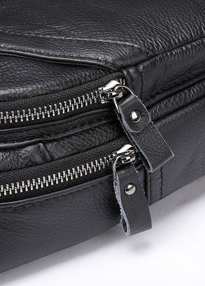 Durable leather messenger bag with adjustable shoulder strap and spacious main compartment for secure storage and organisation