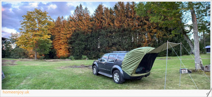 Weatherproof and versatile car trunk extension tent for outdoor adventures, with dual-layer design and secure magnetic fit