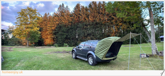 Weatherproof and versatile car trunk extension tent for outdoor adventures, with dual-layer design and secure magnetic fit