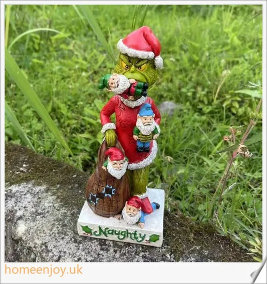A resin garden statue depicting the Grinch sneakily enjoying a snack, surrounded by a group of jolly gnomes.