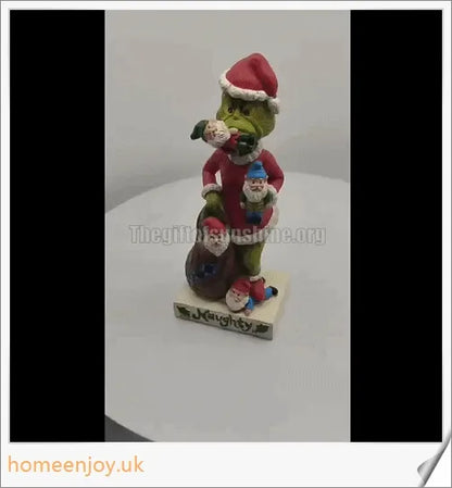 A resin garden statue depicting the Grinch sneakily enjoying a snack, surrounded by a group of jolly gnomes.
