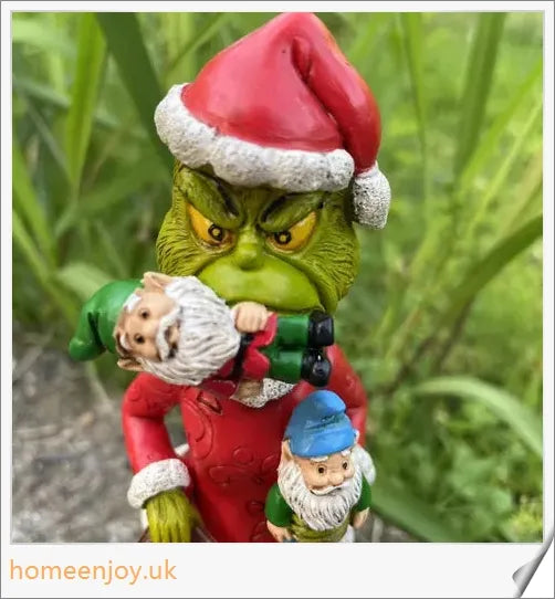 A resin garden statue depicting the Grinch sneakily enjoying a snack, surrounded by a group of jolly gnomes.