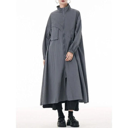 A stylish, army green trench coat with a zipper closure, mandarin collar, and functional pockets.