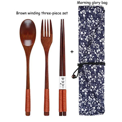 A portable wooden cutlery set with a coordinating cloth bag, perfect for outdoor dining and travel.