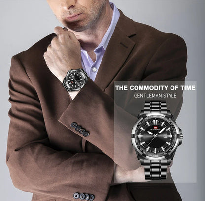 A stylish steel belt watch with a luminous dial and a durable chain, embodying British elegance and quality
