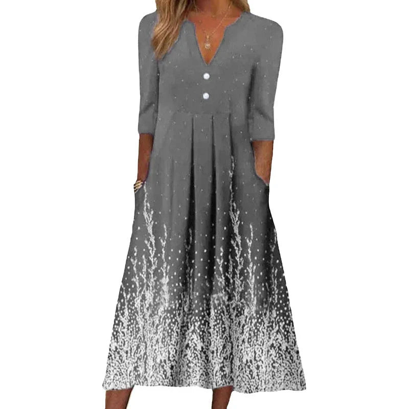 A sophisticated digital printed v-neck long-sleeved dress in vibrant colours, perfect for any occasion.