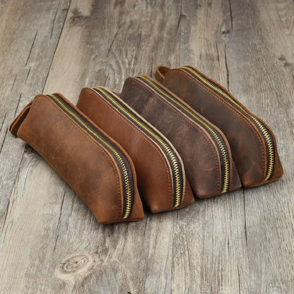 Square leather pencil case in genuine cowhide measuring 18cm with zipper closure