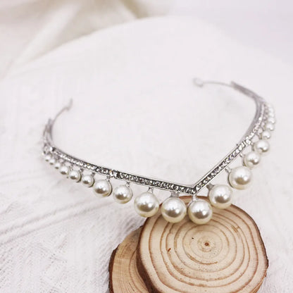 Silver tone bridal crown with pearl detail, about 13 cm diameter and 3 cm height, simple wedding hair accessory