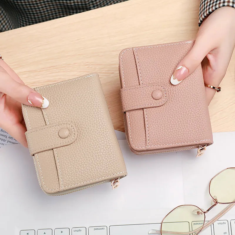Ladies' short wallet with lychee pattern surface, two-fold bifold design, compact card holder wallet for women available in beige, pink, black, and red colour options
