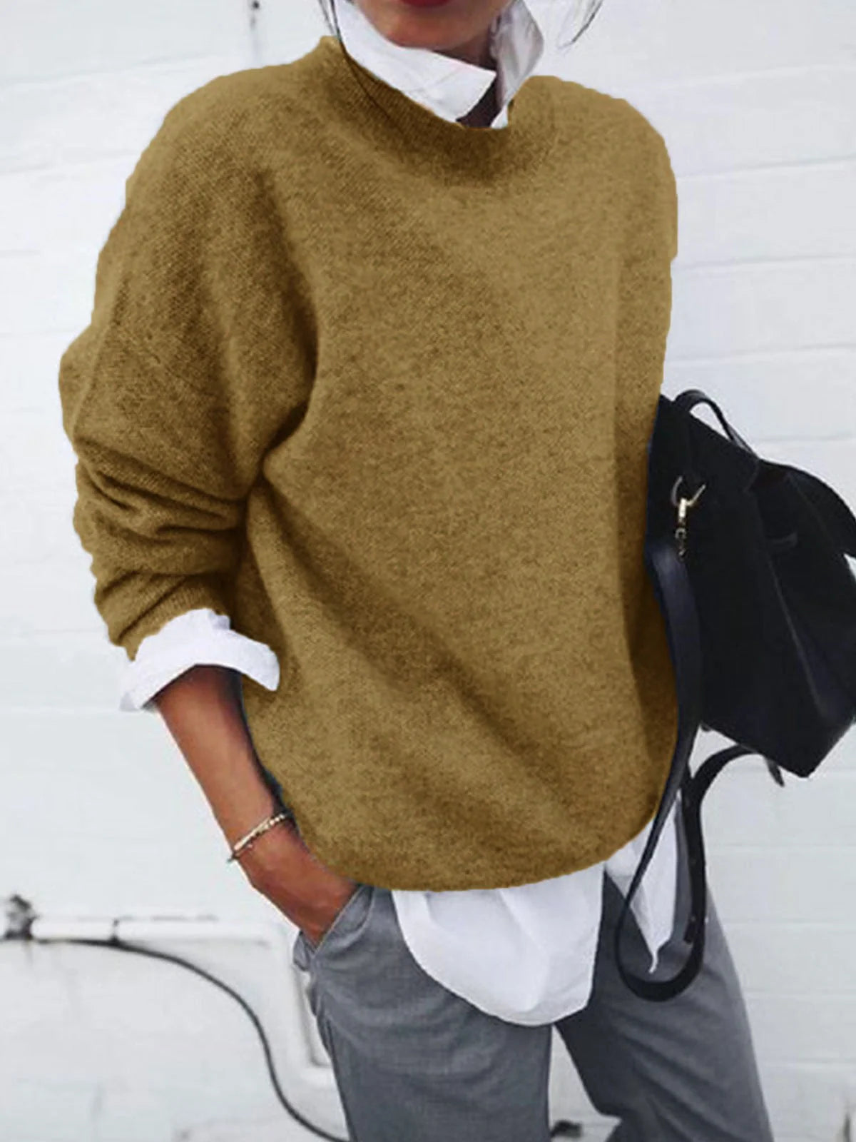 Cosy knitted pullover sweaters in a range of classic British colours for autumn and winter fashion