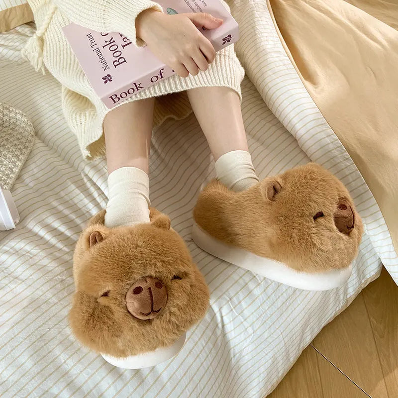 Light brown women's fleece slippers with round toe design and PVC sole