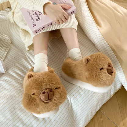 Light brown women's fleece slippers with round toe design and PVC sole