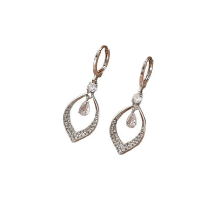 Women's copper teardrop tassel earrings with zircon detail and choice of gold or silver buckle.