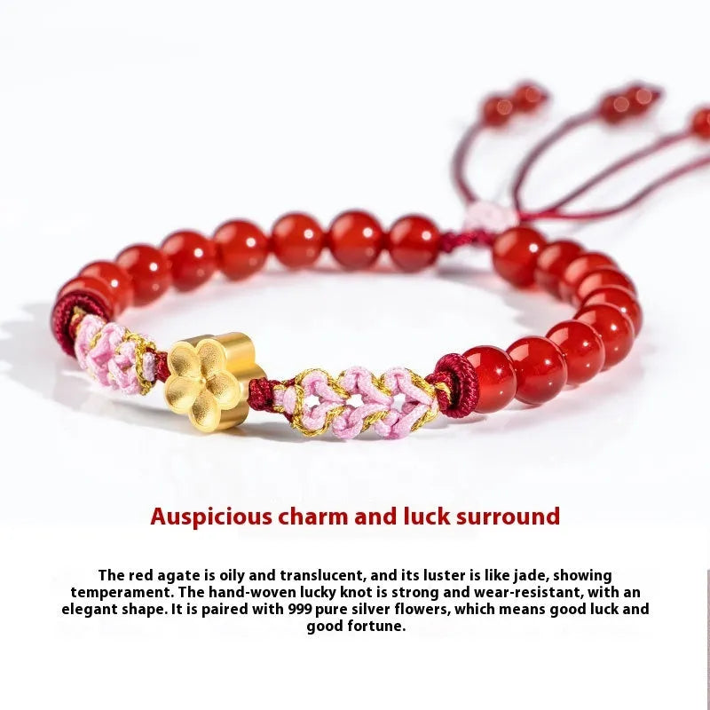 Hand-woven red rope bracelet with crystal peach blossom charm in Chinese style