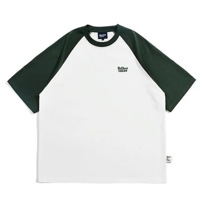 Men's blue loose-fit Japanese style long sleeve t-shirt with raglan sleeves on a hanger.