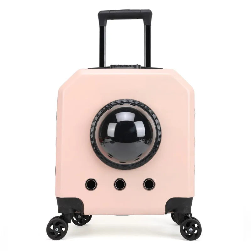 Hard PVC pet trolley flight case in orange colour with wheels and a pull handle.