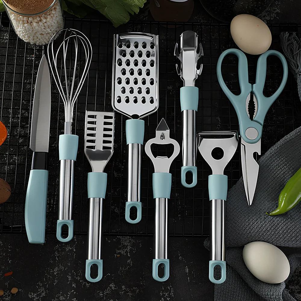6-piece grey stainless steel kitchen utensil set with whisk, peeler, scissors on white background, essential for quick prep