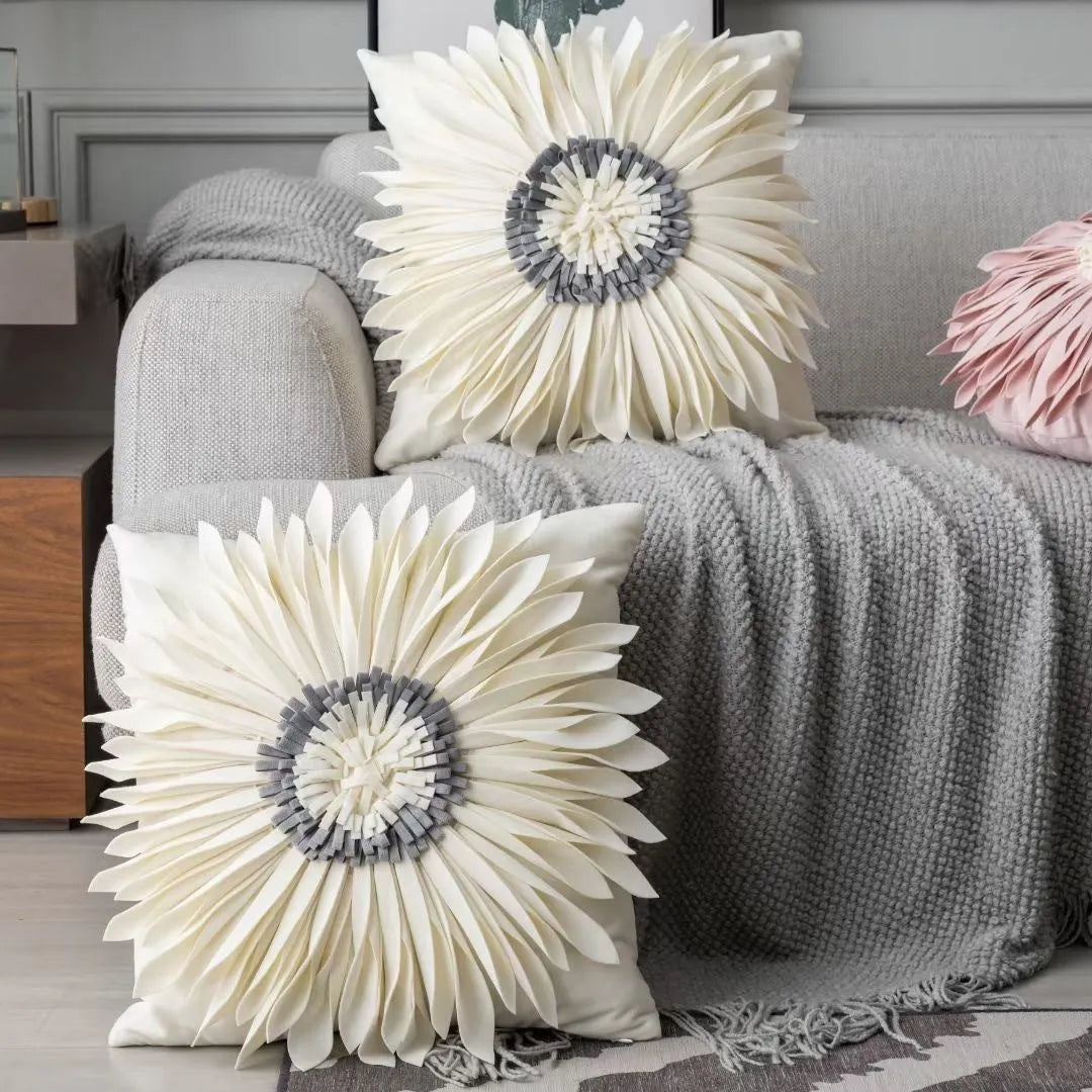 Blue velvet waist pillow with three-dimensional white chrysanthemum tufted design and fringed hem
