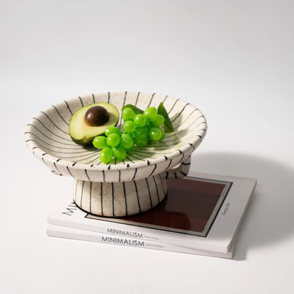 Black and white striped synthetic resin fruit plate with retro fruit motifs, 20cm diameter