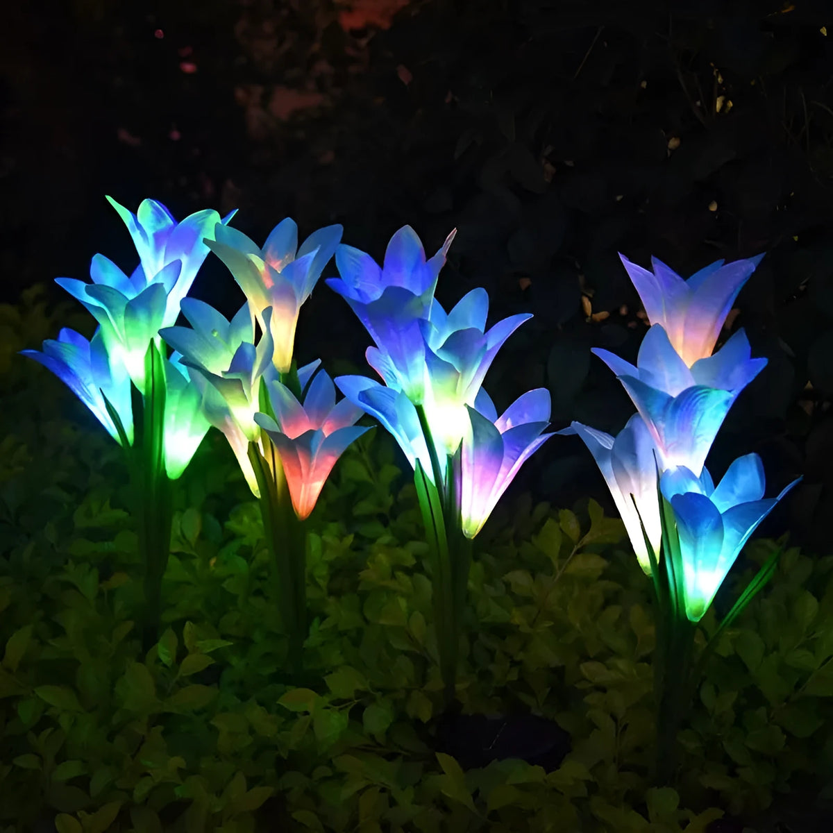 Colourful solar-powered LED lawn lamp in a flower shape for garden decoration.