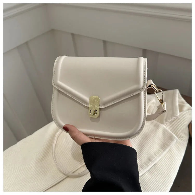 Soft PU leather messenger bag with textured finish in horizontal rectangular shape