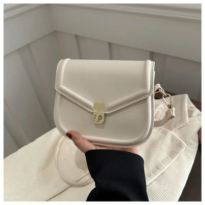 Soft PU leather messenger bag with textured finish in horizontal rectangular shape