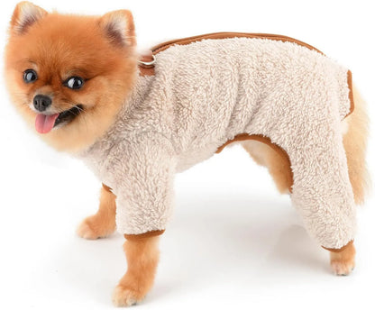 Green plush fleece dog jumpsuit on a small dog, showing the four-leg design and back zipper with D-ring.