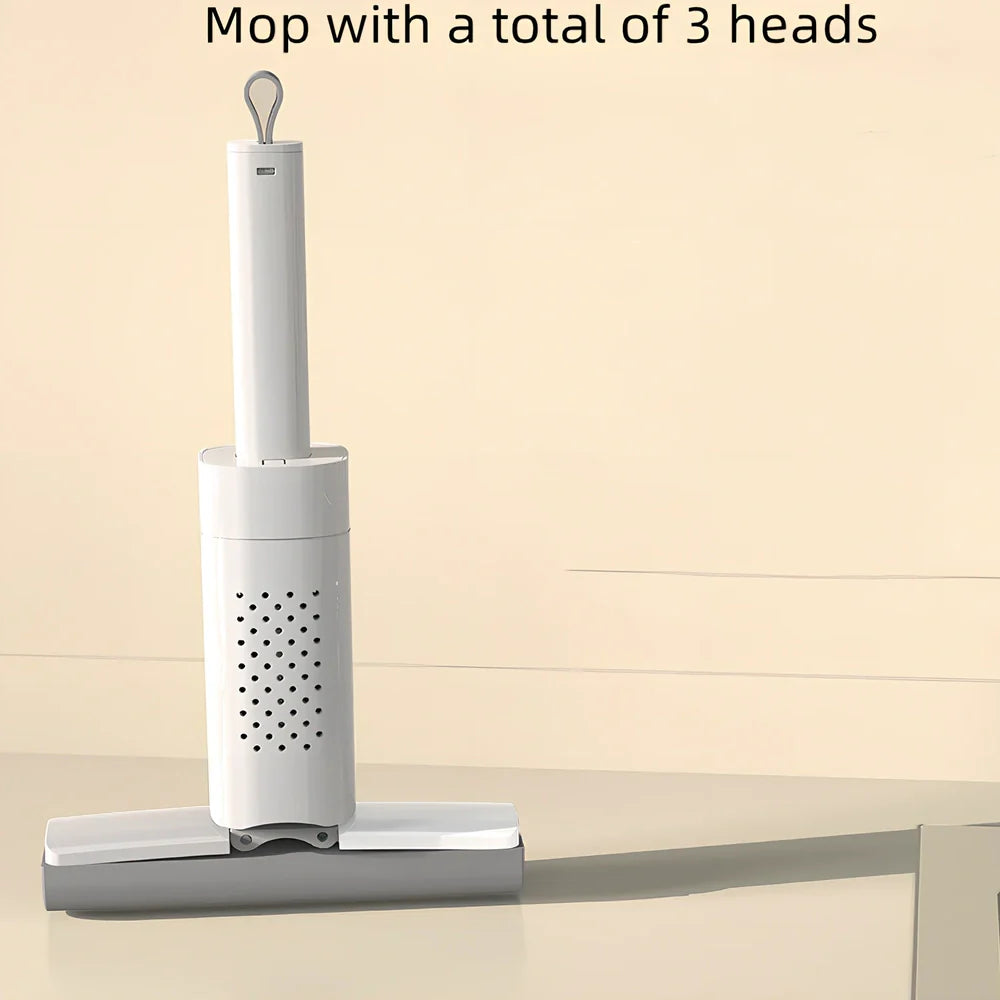 Handheld mini mop with 15cm rubber cotton head and folding squeeze mechanism for compact storage