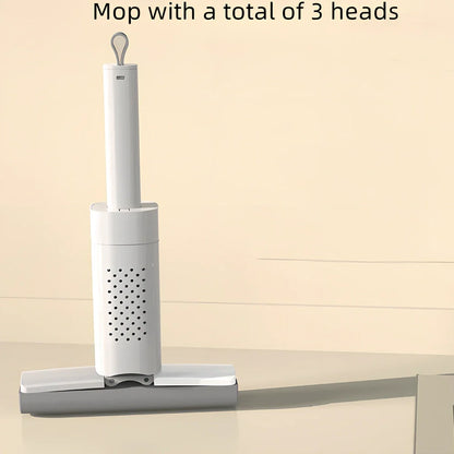 Handheld mini mop with 15cm rubber cotton head and folding squeeze mechanism for compact storage