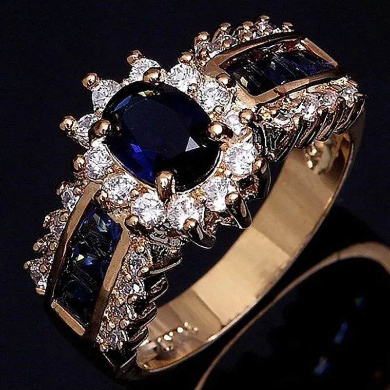 Personalised diamond-treated zinc alloy rings in blue and purple designs with size options 6-11