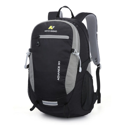 Dark green 30 litre nylon waterproof hiking backpack with airpillow straps on a neutral background.