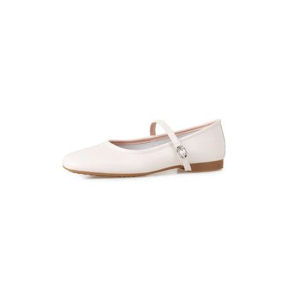 Women's sheepskin Mary Jane flat shoes in brown, showing round toe and low heel.